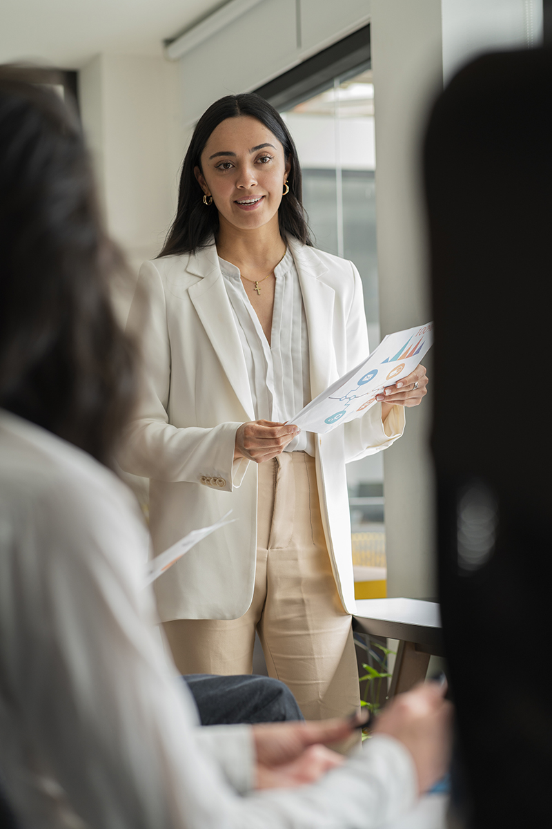A woman leading a workplace presentation